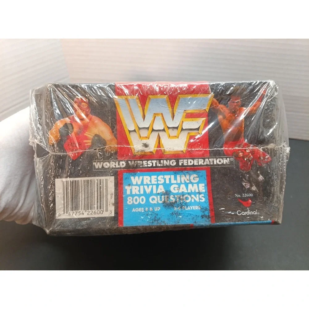 WWF Wrestling Trivia Game Tin SEALED NEW WWE ROCKY MAIVIA Rookie ROCK AUSTIN RC